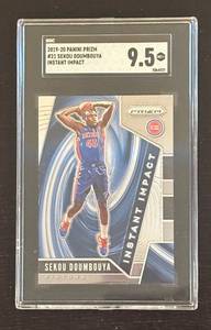 lot 463R image: B - Panini Prizm Instant Impact #21 Sekou Doumbouya SGC 9.5 MT Graded Pistons Card