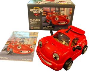 lot 112C image: B - Chevron Cars Tony Turbo Collectible Toy Car with Box and Manual