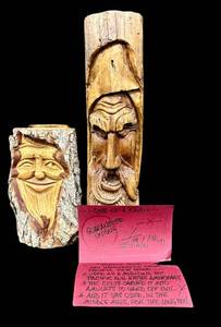 Tim Quinn Graphics - 2 Hand-Carved Wood Faces on Logs