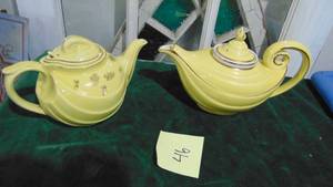 lot 46 image: 2- Yellow Hull Teapots