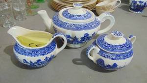 lot 55 image: Unmarked Blue Willow Teapot, Sugar and Creamer