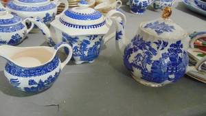lot 57 image: Assorted Blue Willow, 2-Teapots and Cremer