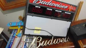 lot 104 image: Light up Budweiser Sign and Plastic Budweiser Sign-asis