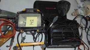 lot 142 image: Battery Charger, Work Light and Gun Cleaning Kit