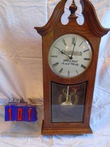 lot 101 image: Glenfiddich scotch clock. 32 x 14. Works. As shown.