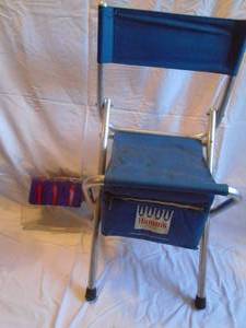 Vinatge Hamms folding chair/cooler. Looks nearly new. One side of back rest and bottle of cooler need to be re sewn. As shown.