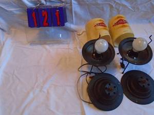 lot 121 image: GrainBelt lights with plastic tubes. Looks like bolts are missing. Only one ive ever seen. As shown.