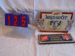 lot 125 image: Qty of 2 Blatz signs. One cardboardfoil over wood. As shown.