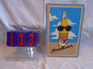 lot 133 image: New SOL Sun Beer tin sign. 14 x 10. As shown.