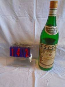 lot 142 image: Stock Vermouth plastic bank bottle. Approx 20� tall. Good label. As shown.