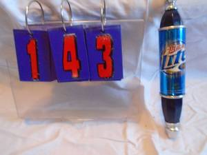 lot 143 image: Miller Lite tap handle. Very nice shape. As shown.