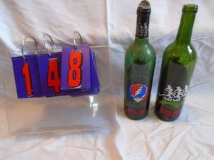 lot 148 image: Pair of Grateful Dead empty wine bottle. Good labels. As shown.