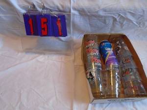 lot 151 image: Flat of NFL beer glasses & Vikings Pepsi can. As shown.