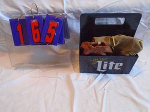 lot 165 image: Lite beer napkin nolder & Crown Royal bags. As shown.