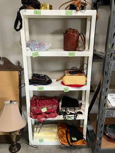 lot 17 image: White 4-Shelf Plastic Storage Rack 65x30x10 Inches - Contents not included.