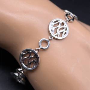 lot 94 image: Natural Diamond Modern Ocean Wave Halo Link Bracelet Retail $125