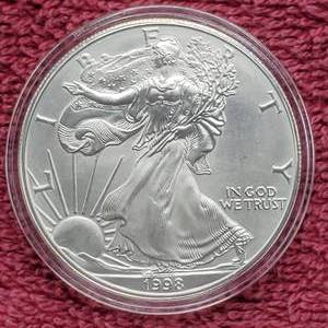 lot 13 image: 1998 American Silver Eagle in Airtite