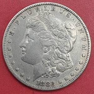 lot 26 image: 1882 Morgan Silver Dollar--90% Silver