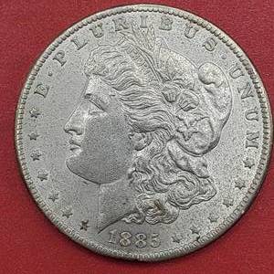 lot 31 image: 1885-O Morgan Silver Dollar--90% Silver