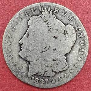 lot 34 image: 1887-O Morgan Silver Dollar--90% Silver