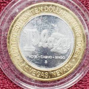 lot 104 image: Plaza $10 Gaming Token in Airtite--Center is .60 toz. of .999 Silver