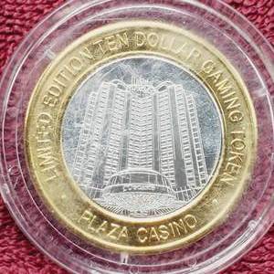 lot 107 image: Plaza $10 Gaming Token in Airtite--Center is .60 toz. of .999 Silver