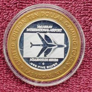 lot 110 image: Gaming Token in Airtite--Center is .60 toz. of .999 Silver