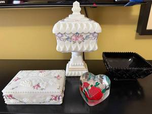 lot 23 image: White Floral Milk-Glass Box, Cake Stand with Lid, Heart Paperweight & Black Dish