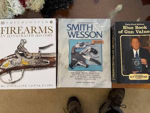 lot 358 image: Smithsonian Firearms An Illustrated History - S&W Catalog - Colt An American Legend