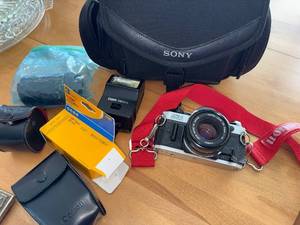 lot 415 image: Canon AE-1 Program 50mm FD Camera Kit with Vivitar MC Teleconverter & Speedlite 188A