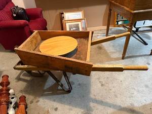 lot 486 image: Vintage Handmade Wooden Decorative Wheelbarrow CartPlanter with Round Lid Disk and Metal Wheel