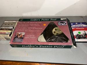 lot 509 image: Golfers Patio Pool - Boxed Outdoor Toy, Harley-Davidson DVD, Cassette Tape Lot
