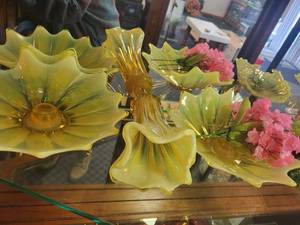 lot 111 image: Set of Yellow Art Glass Flower-Shaped Bowls and Vases