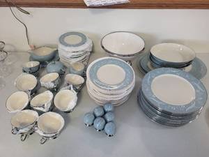 lot 133 image: Elegant Blue and White China Dinnerware Set with Silver Trim