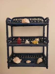lot 186 image: Blue Wicker 3-Tier Wall Shelf with Decorative Shells and Figurines