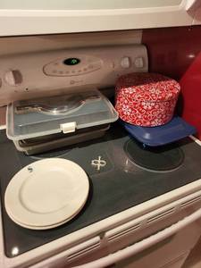 lot 218 image: Assorted Kitchen Storage Containers with Plates and Holiday Tin