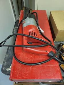 lot 229 image: Milwaukee Heavy-Duty Sawzall Reciprocating Saw with Metal Case