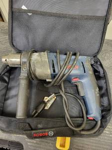 lot 251 image: Bosch Corded Power Drill with Auxiliary Handle and Case