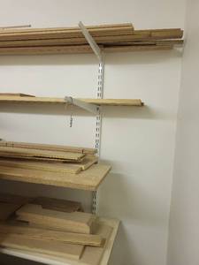 lot 293 image: Assorted Lot of Wood Boards, Shelves, and Dowels for Woodworking