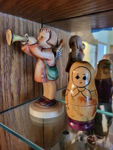 lot 392 image: Hummel Angel with Trumpet Figurine and Russian Nesting Dolls Group