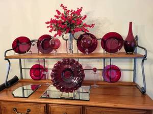 lot 408 image: Collection of Red Art Glass Decor Pieces with Plates, Vases, and Candle Holder