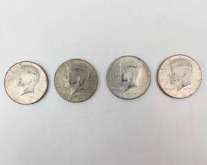 lot 34 image: 4) 1967 40% Kennedy Half Dollars