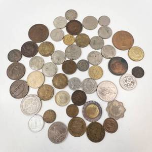 lot 140 image: 1 bag of misc. world coins mixed dates and country