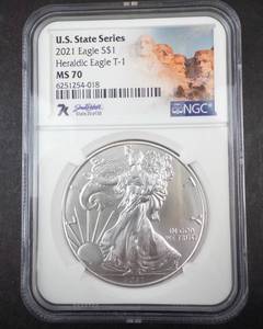 lot 303 image: 2021  MS70 Type 1  American Eagle  U.S. State Series South Dakota NGC slabbed