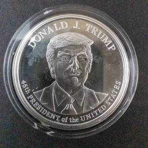 lot 68D image: Donald J. Trump Commemorative Silver Round 1Troy Oz. .999 Silver Round in case 45th President