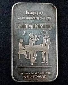 lot 68P image: 1987 National Mint Happy Anniversary Silver Art Bar