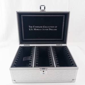 lot 2D image: The Complete Collection of U.S Morgan Silver Dollars Silver Tone Box With Key