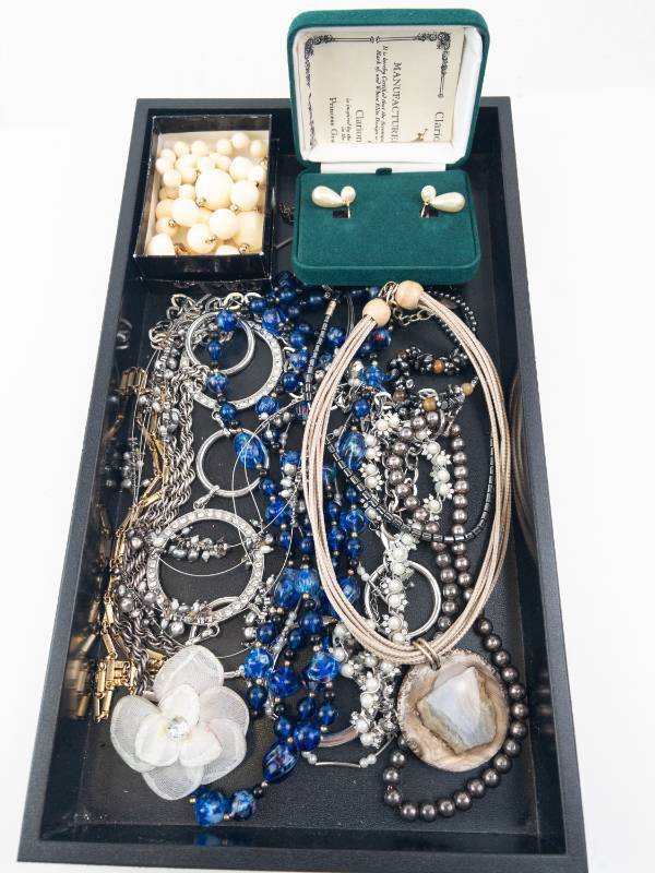 lot 108 image: Jewelry Lot - Blue Bead Necklaces, Pearl Drop Earrings, Silver Hoop Bracelets, Geode Pendant