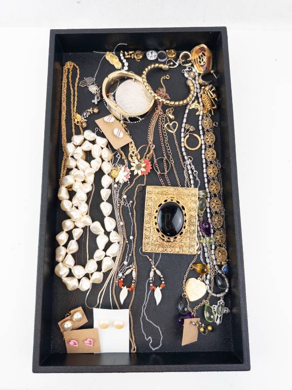 lot 137 image: Costume Jewelry Lot - Pearl Necklace, Black Cabochon Pendant in Ornate Gold Frame, Gold Chains & Earrings