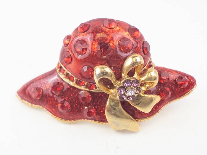 lot 196 image: Red Rhinestone Hat Brooch with Gold Bow - Vintage-Style Costume Jewelry